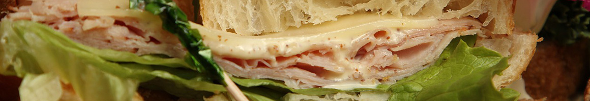 Eating Sandwich at Aroma's Java Cafe restaurant in Cincinnati, OH.